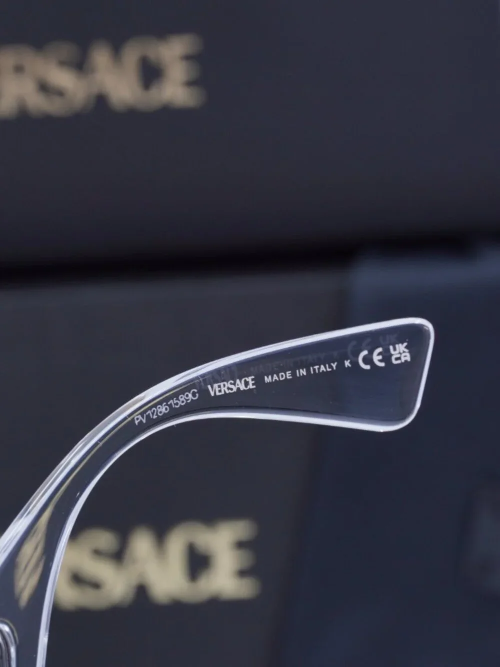 Versace VE4482 148/8V Rectangle Sunglasses – Transparent / Clear Mirror Silver